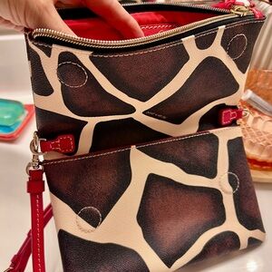 Vintage Dooney and Bourke cross baby bag in animal print